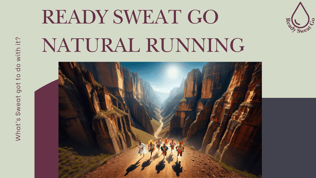 Group running along canyon trail under sun, 'Ready Sweat Go Natural Running' banner, outdoor fitness