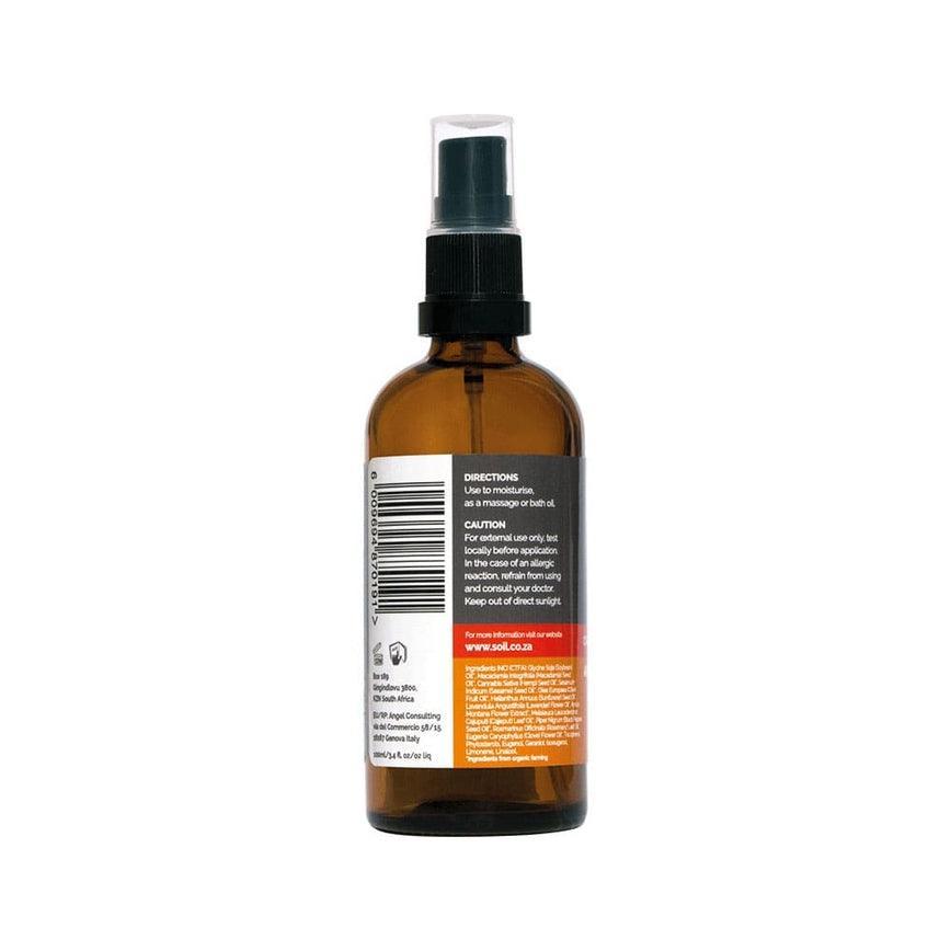 Amber spray bottle with black label, ingredients, barcode, and directions on white background
