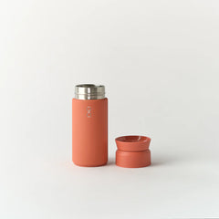 Sahara Red 350ml insulated travel mug with stainless steel lid on white background