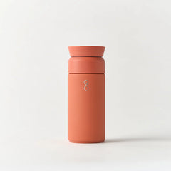 Sahara Red 350ml insulated brew bottle with silver logo on white background