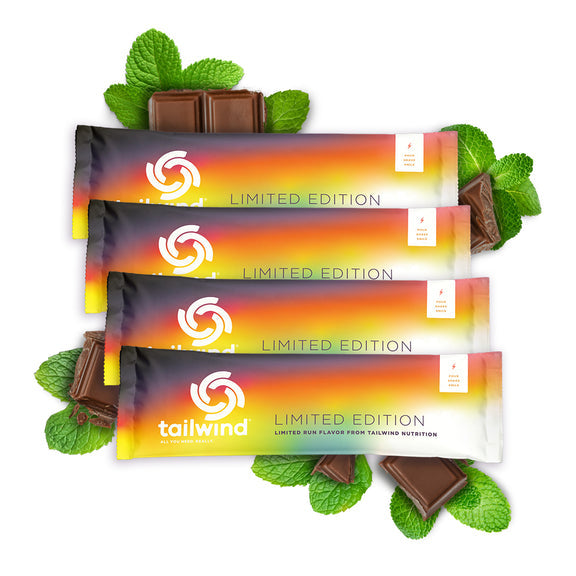 Tailwind Nutrition chocolate mint limited edition drink mix packets with chocolate and mint leaves