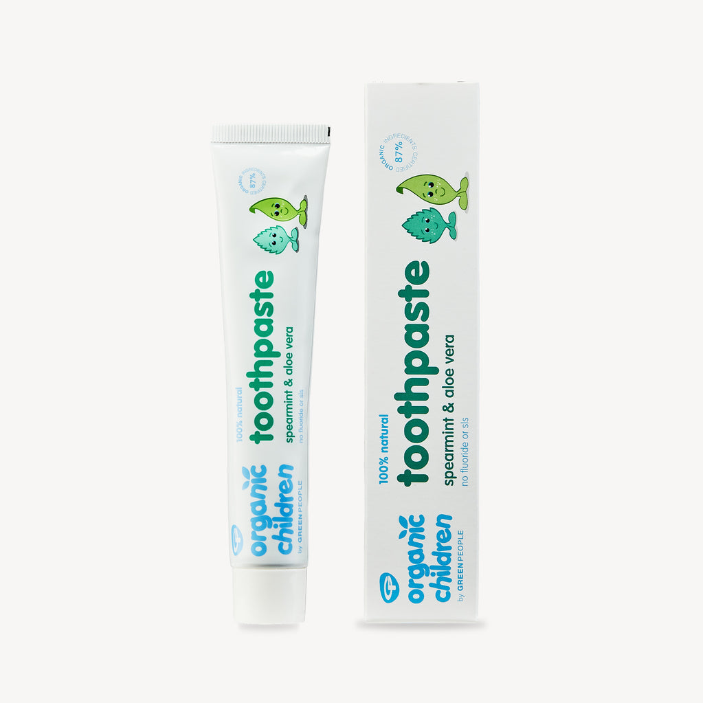Organic Children toothpaste tube and box, spearmint aloe vera flavor, white background