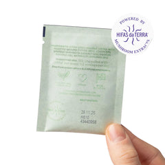 Hand holding London Nootropics Mojo sachet with ingredients and powered by mushroom extracts label