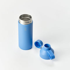 Lagoon blue reusable water bottle with open lid and stainless steel interior on white background