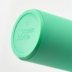 Green Ocean Bottle reusable water bottle with logo and NFC symbol on lid
