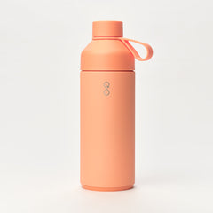 Sunset peach reusable water bottle with screw cap and loop handle on white background