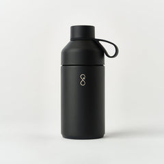 Matte black reusable water bottle with loop cap and minimalist logo on white background