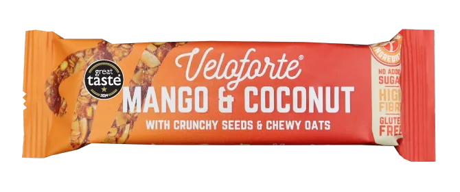 Veloforte Mango & Coconut oat snack bar in orange packaging with health highlights visible