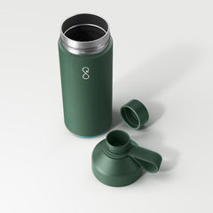 Forest green Ocean Bottle reusable water bottle with open cap and lid on white background