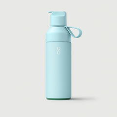 Sky blue Ocean Bottle GO reusable water bottle with lid and handle on white background