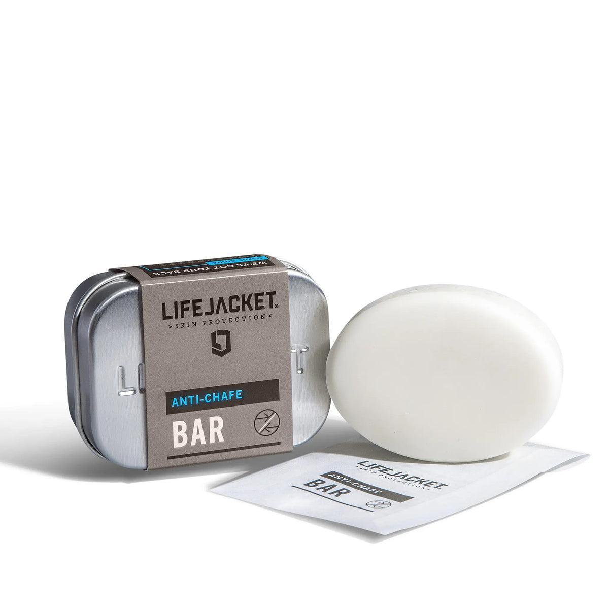 LifeJacket Anti-Chafe Bar with metal travel tin and white solid bar on white background