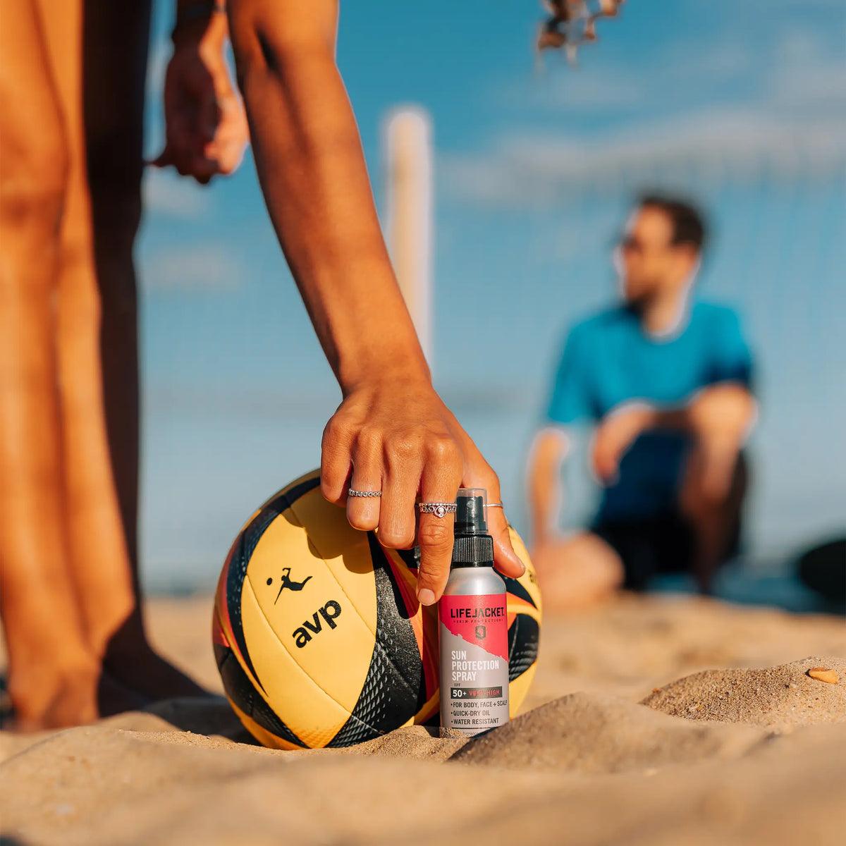 LifeJacket SPF50 sun protection spray being used outdoors