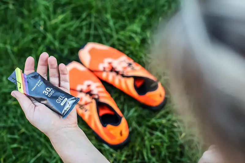 PF30 gel in front of running shoes.