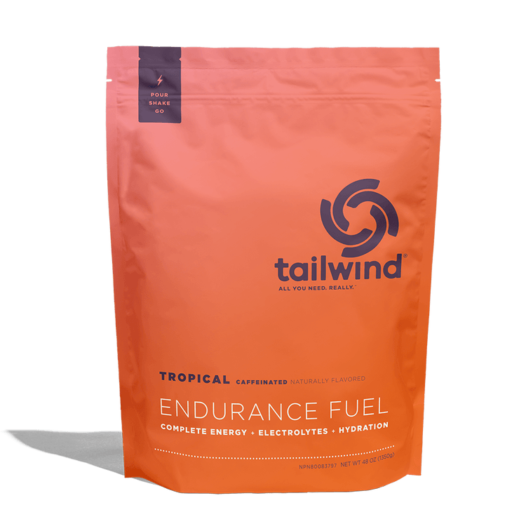 Tailwind Endurance Fuel Tropical Caffeinated energy drink powder orange pouch