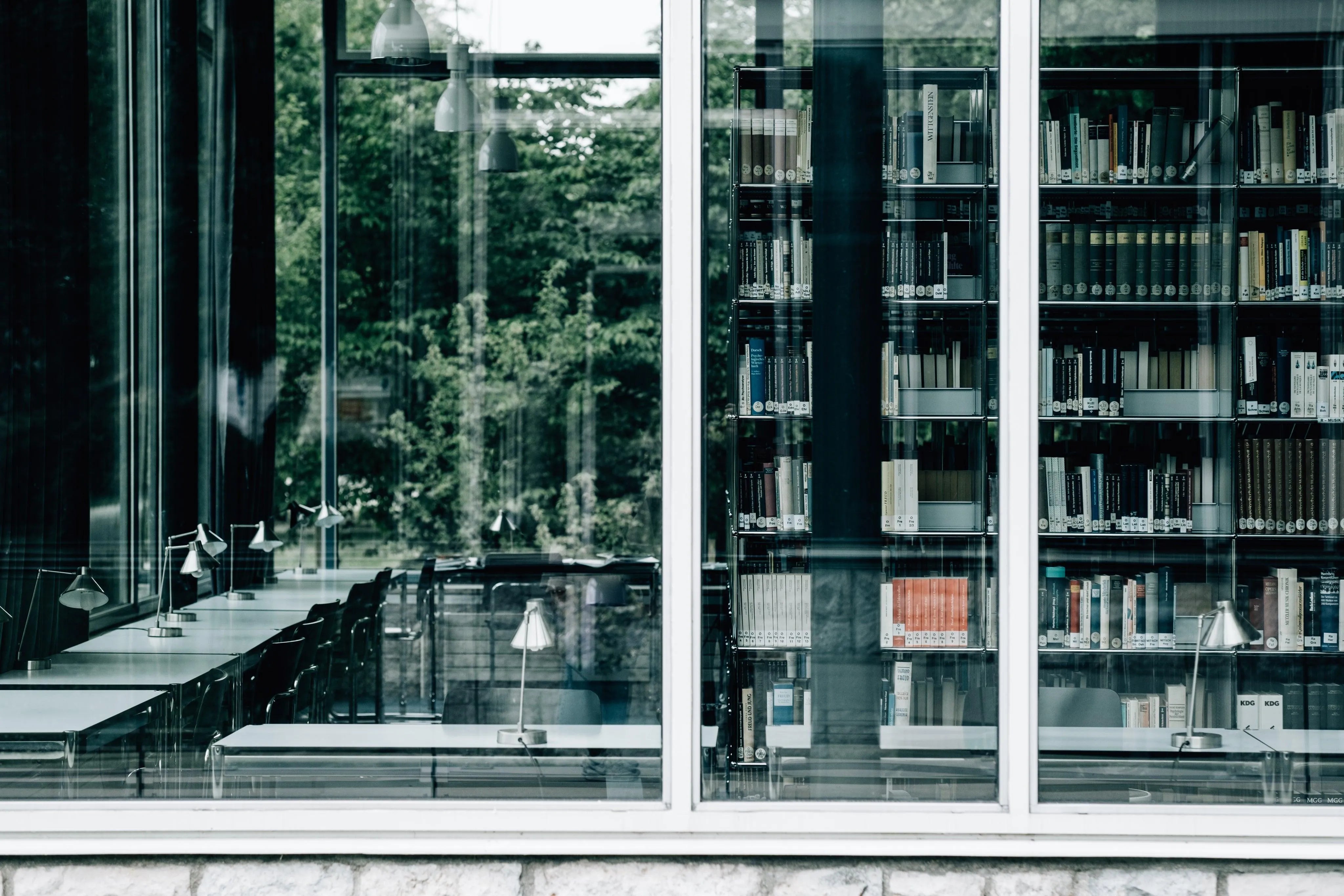 large-window-with-books-and-tables-inside - Ready Sweat Go