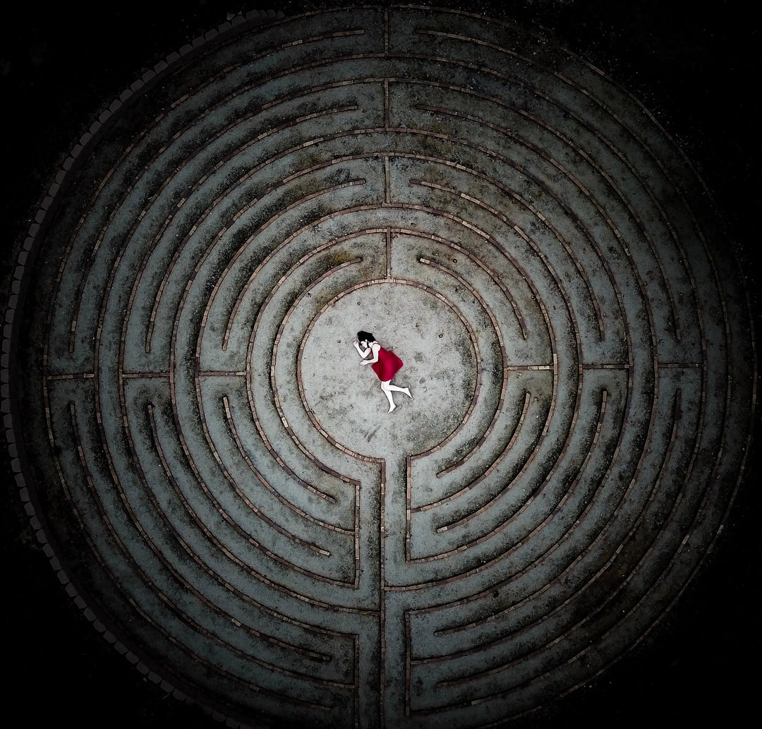 laying-down-at-the-center-of-a-maze - Ready Sweat Go