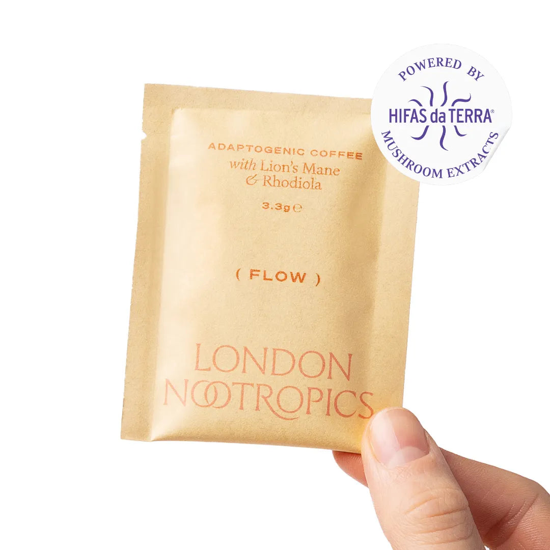 London Nootropics Flow adaptogenic coffee sachet with Lion’s Mane and Rhodiola held by hand