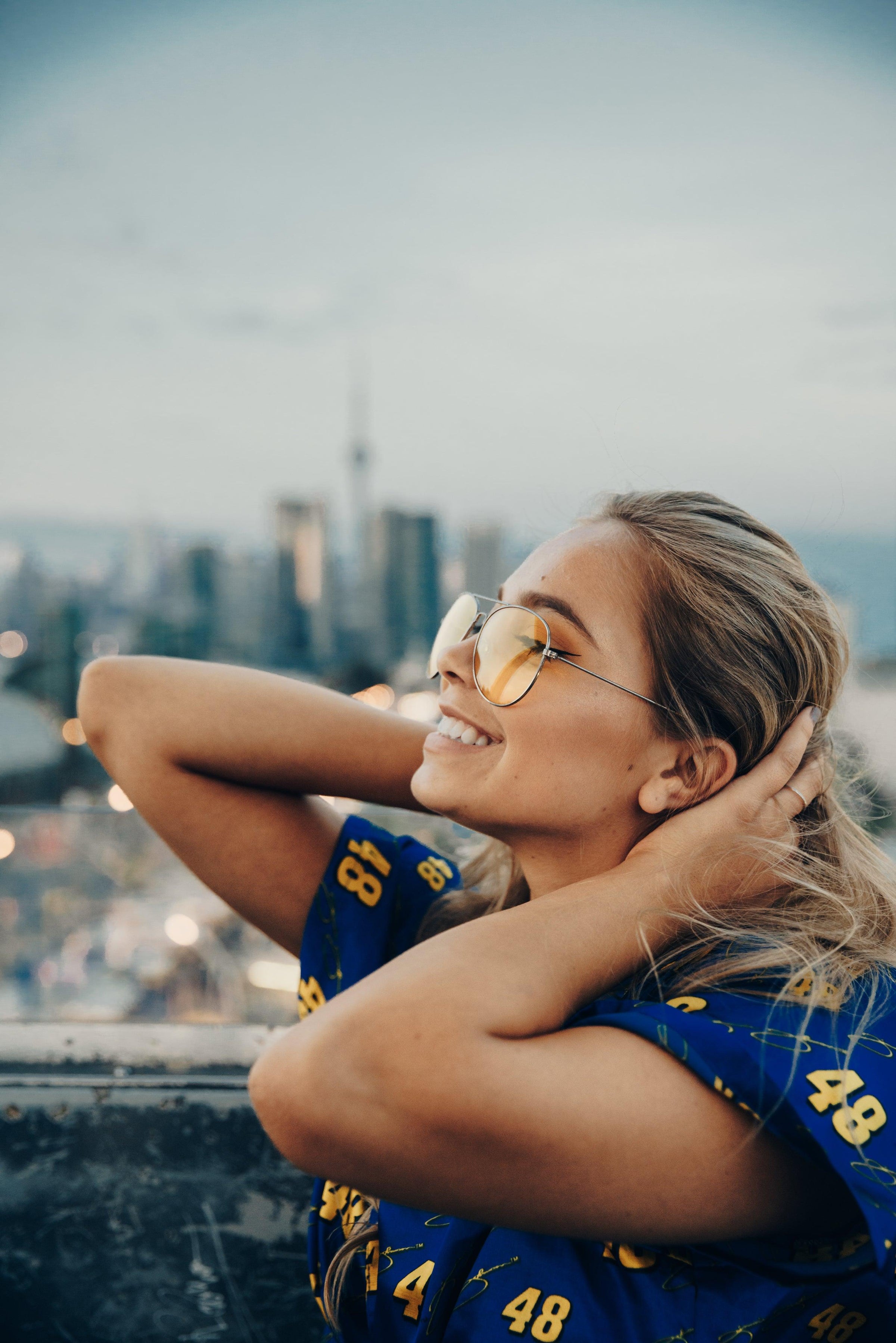 smiling-woman-with-skyline - Ready Sweat Go