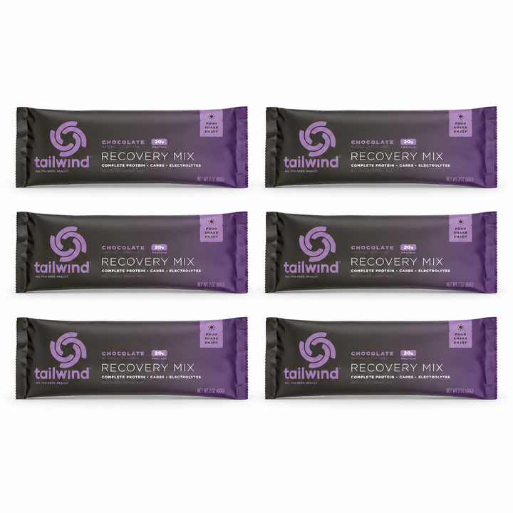Six Tailwind chocolate Recovery Mix sachets.