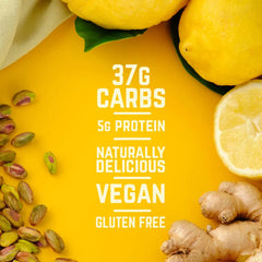 Lemons, ginger, pistachios and nutrition facts on a yellow background for vegan energy bar