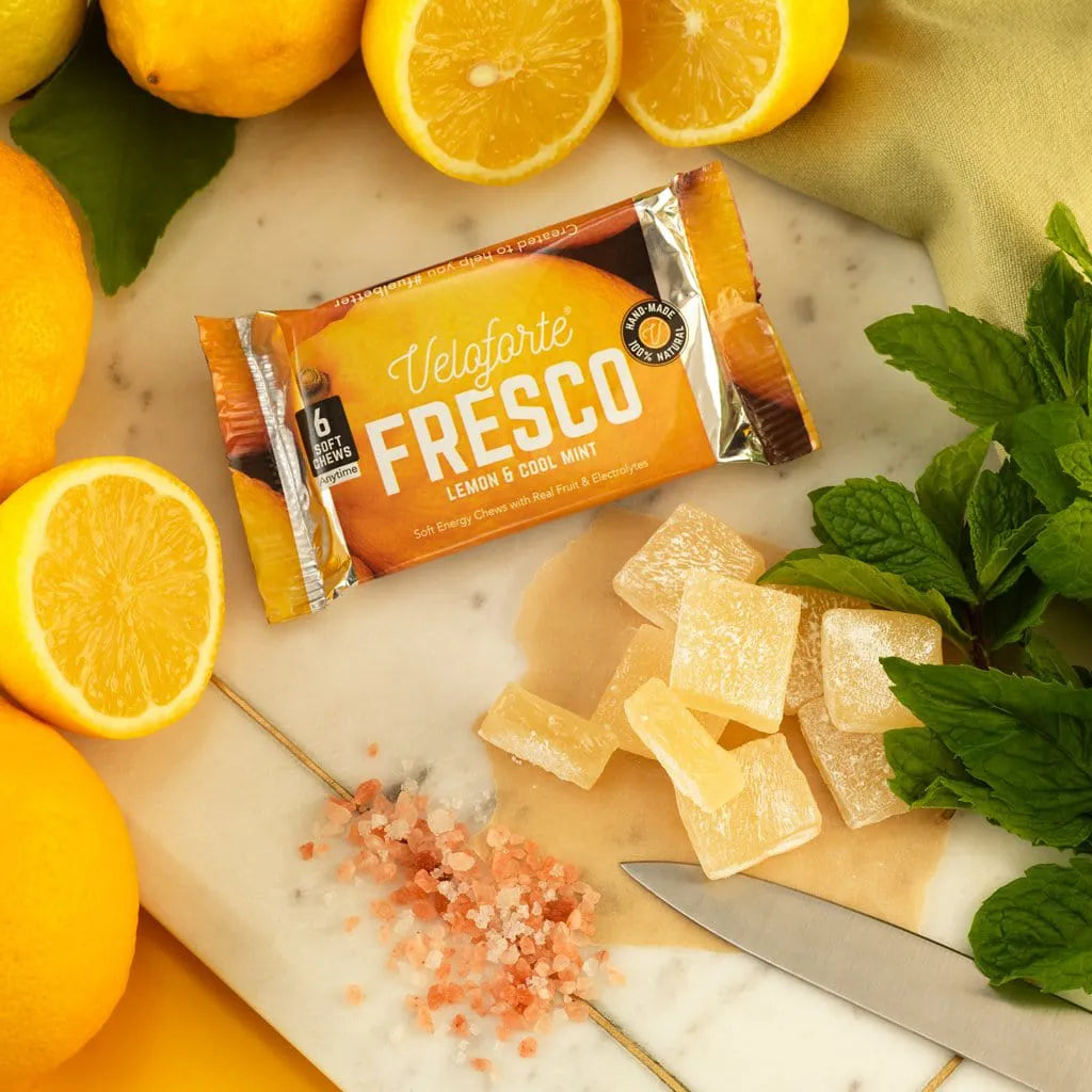 Veloforte Fresco lemon and mint energy chews with lemons, mint, and pink salt on marble