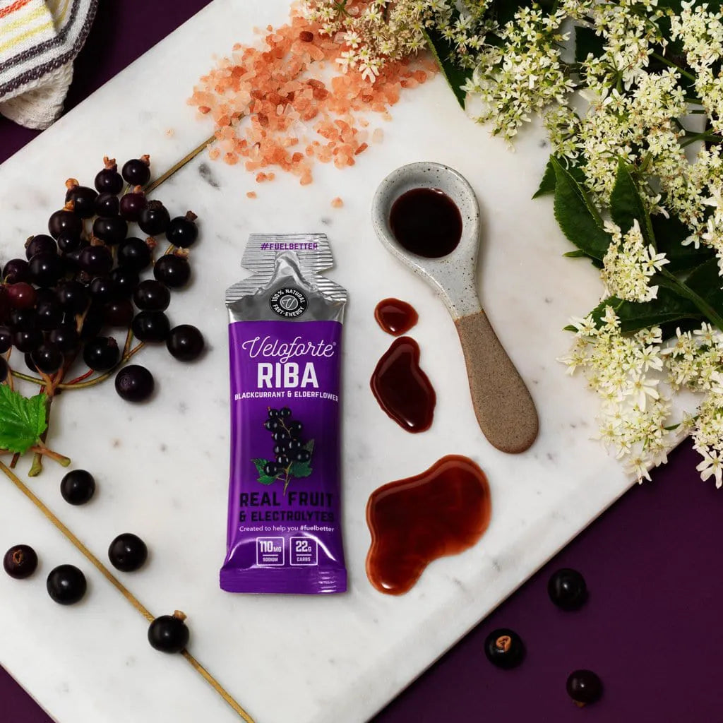 Veloforte RIBA natural energy gel with blackcurrant, elderflower, and sea salt on marble